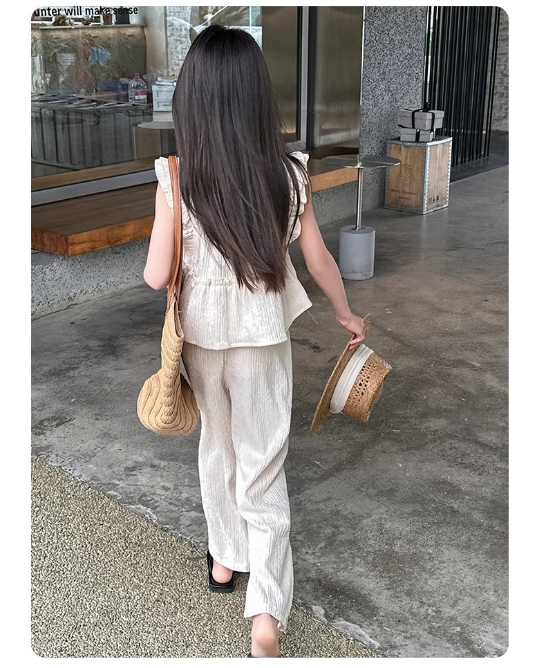 Completo bimba top senza maniche e pantaloni gamba larga_voghion.com