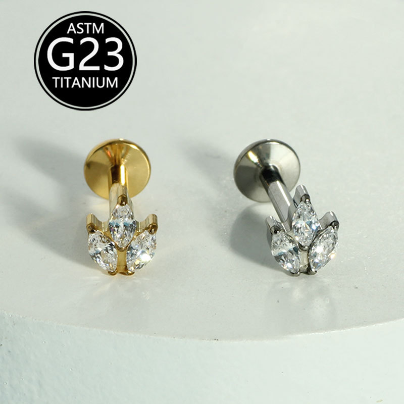 Silver pointed spike labret stud material detail