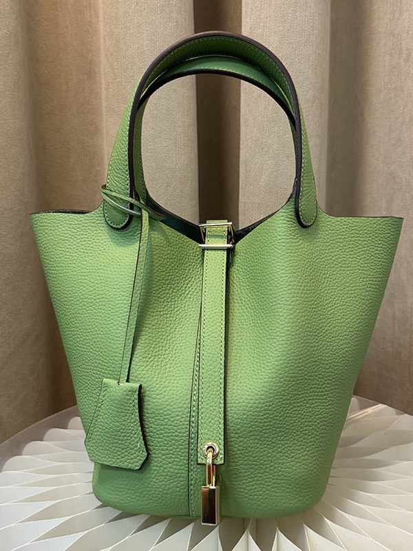 Bolsa de mano de nicho de piel de vaca de alta versión, bolsa de cestas de verduras, cuero real de gran capacidad, bolsa de cubo de alta calidad.