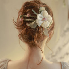 唐の気質の花の1字は女性の2025新型の高級感のヘアピンの後頭部の超仙のアヒルの口を挟んで飾ります。