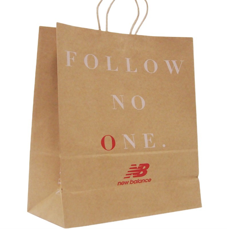 Bolsas de papel kraft ropa horneado bolsas de regalo personalizadas bolsas de papel kraft portátiles bolsas de regalo al por mayor logotipo impreso