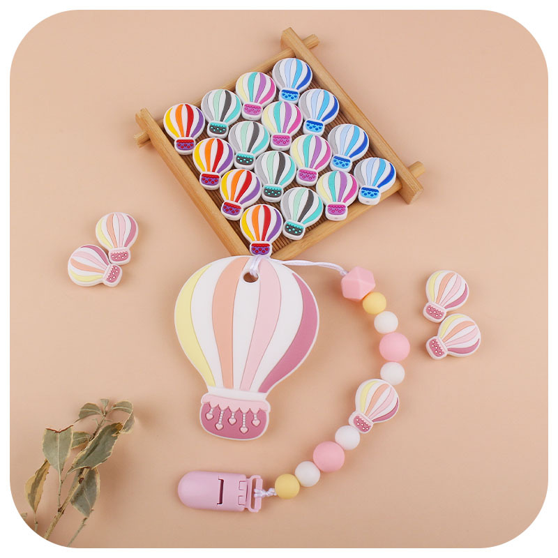 Bebé dibujos animados colorido globo de aire caliente silicona teether bebé teether palo juguete teether pezón cadena anti-caída