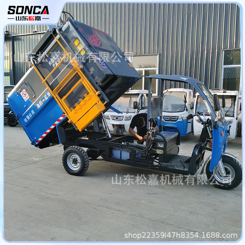 Vehículo de limpieza de basura de 4 toneladas de autocarga y descarga de propiedad de la comunidad de descarga de basura eléctrica de cuatro ruedas