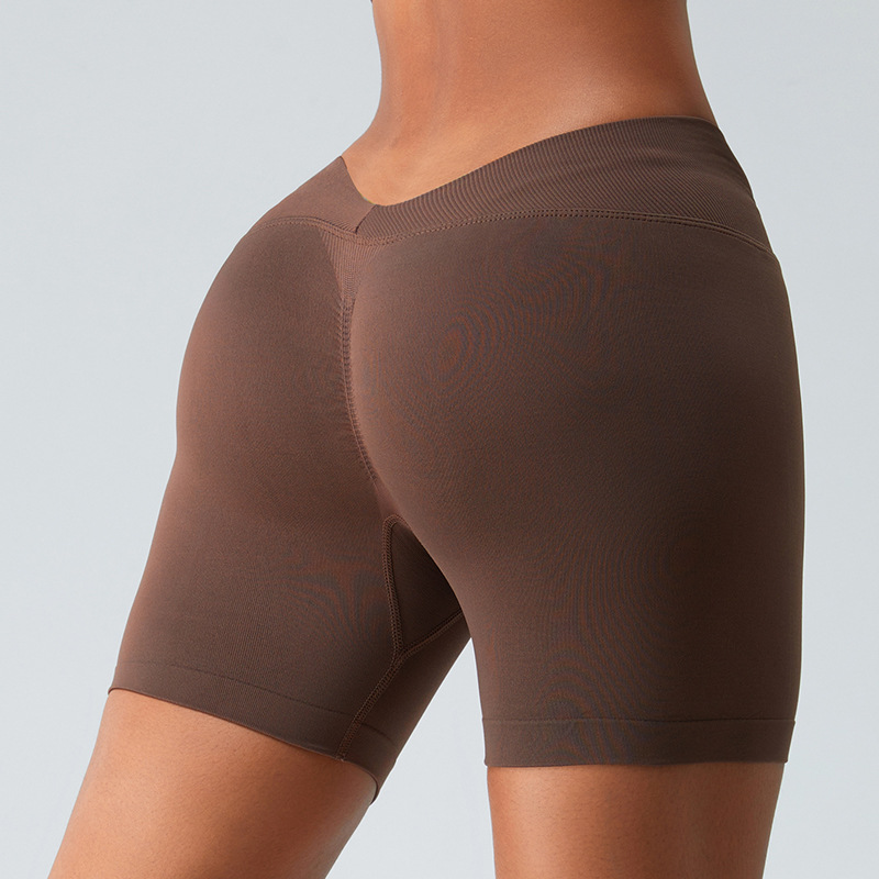 Transfronterizos europeos y americanos sin fisuras de tres puntos pantalones cortos deportivos de melocotón de las mujeres levantamiento de cadera correr apretado fitness deportes pantalones cortos de yoga