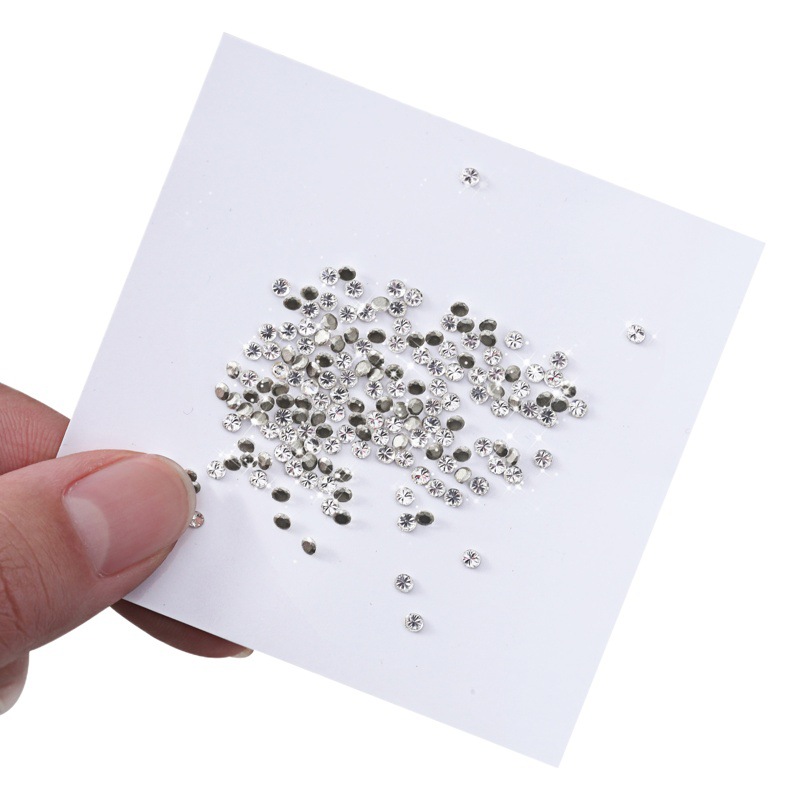 Joyería de uñas nuevo invertido mini ZIRCON diamante transparente blanco intermitente caballo ojo gota de agua tamaño pequeño ZIRCON decoración de uñas