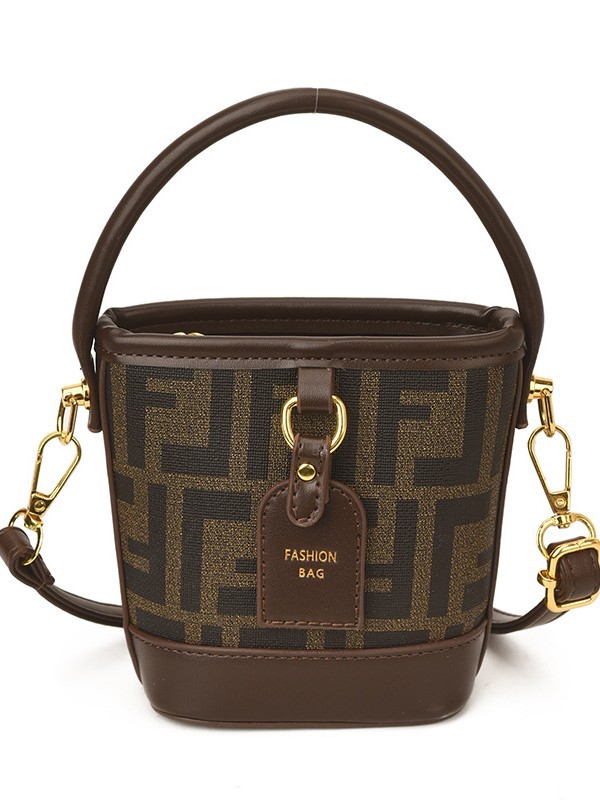 Mini pequeño bolso de cubo de mano para niños 2026 nuevo estilo de alta calidad de moda versátil bolso de mochila de estilo exterior