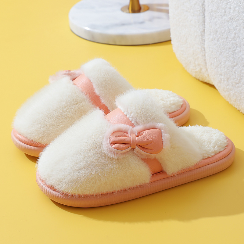 thumbnail image 1 of Nuevas zapatillas peludas de suela gruesa con zapatillas de algodón con lazo para parejas de mujeres invierno Otoño e Invierno hogar cálido y antideslizante, 1 of 5