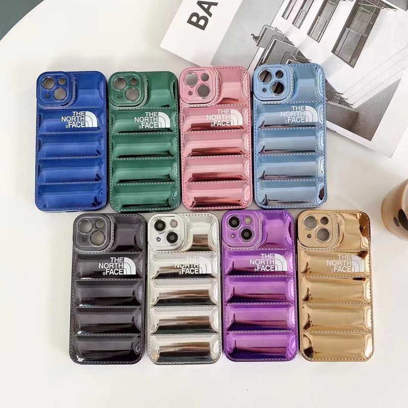 Suitable for Apple model 14PRO electroplated fine hole Tide brand north bread down jacket air cushion phone case protective cover Suitable for Apple model 14PRO electroplated fine hole Tide brand north bread down jacket air cushion phone case protective cover