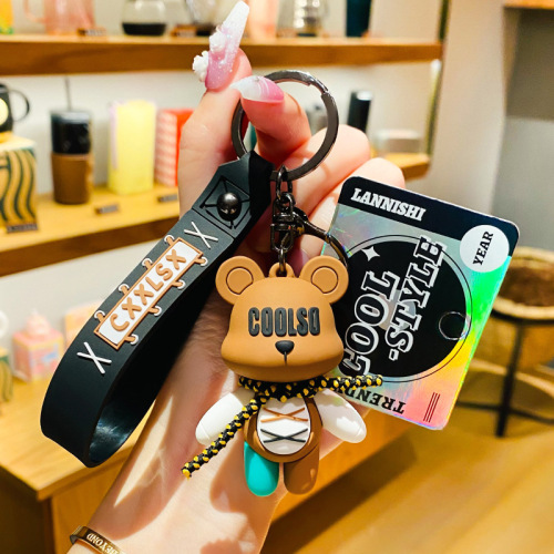 Genuine creative cartoon strap bear doll pendant car keychain school bag pendant couple exquisite small gifts wholesale