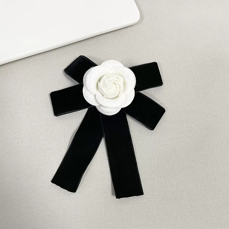 欧美新款仿羊毛蝴蝶结胸针领花布艺丝带山茶花胸花服装配饰礼服