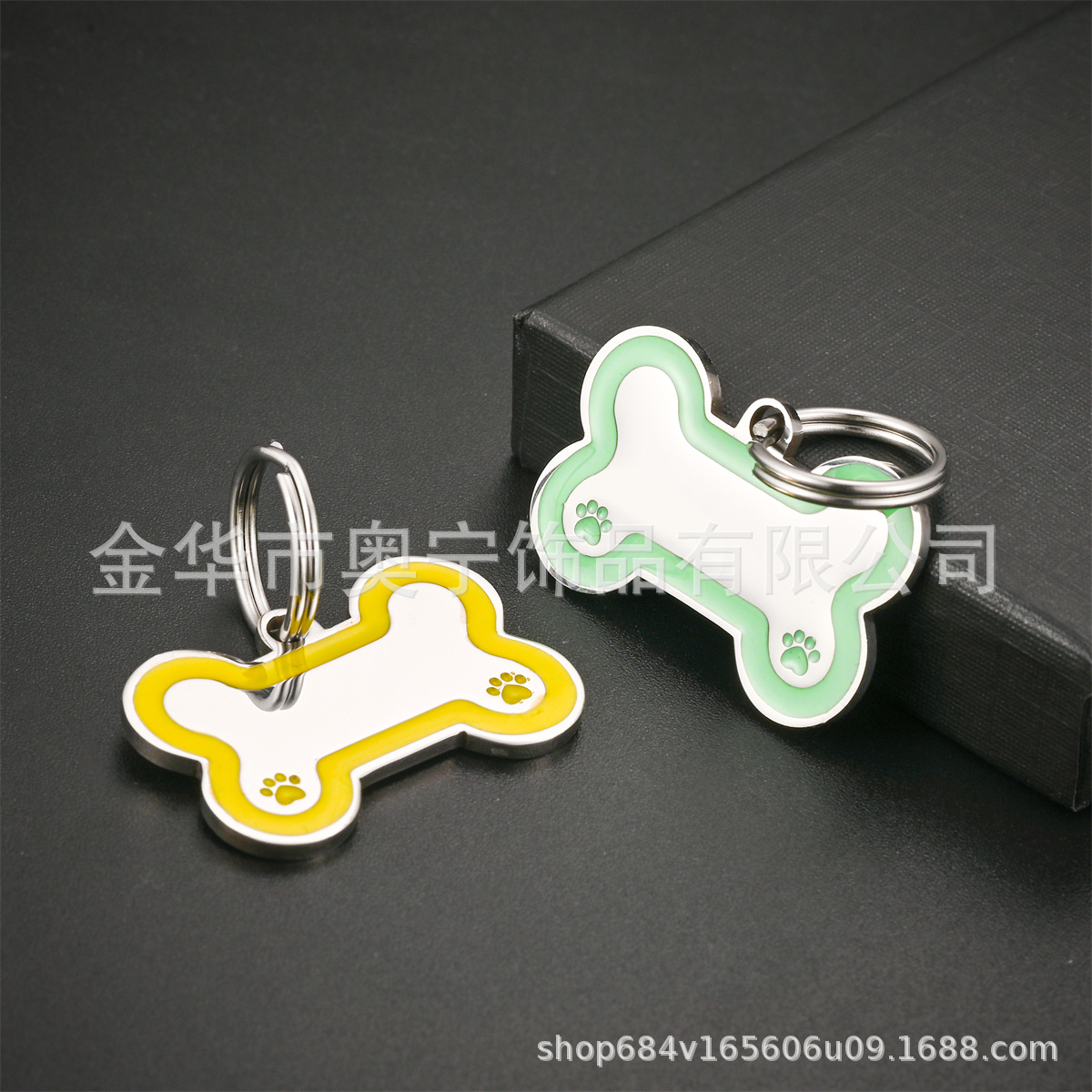 Spot al por mayor de acero inoxidable marca de perro de goteo nuevo hueso de perro marca de mascota fuente transfronteriza de acero de titanio marca anti-pérdida