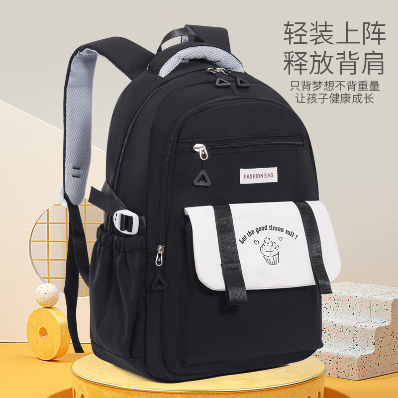 Fábrica al por mayor estudiante de secundaria schoolbag simple moda de gran capacidad impermeable reducción de carga mochila de viaje