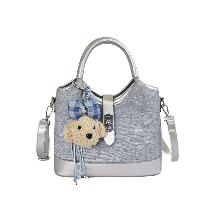 Bolsa de mano de color chocante para mujeres 2026 nueva moda versátil bolso de cubo de verano mochila de viaje