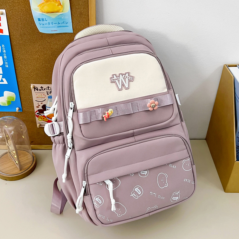 Nueva mochila de hombro simple letras negras con lindos colgantes mochila de carga mochila de gran capacidad