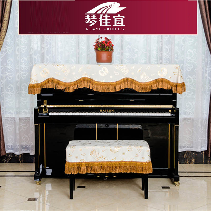 Fabricante al por mayor tela patrón de moda nota media capa cubierta de piano cubierta a prueba de polvo cubierta de piano electrónica con flecos