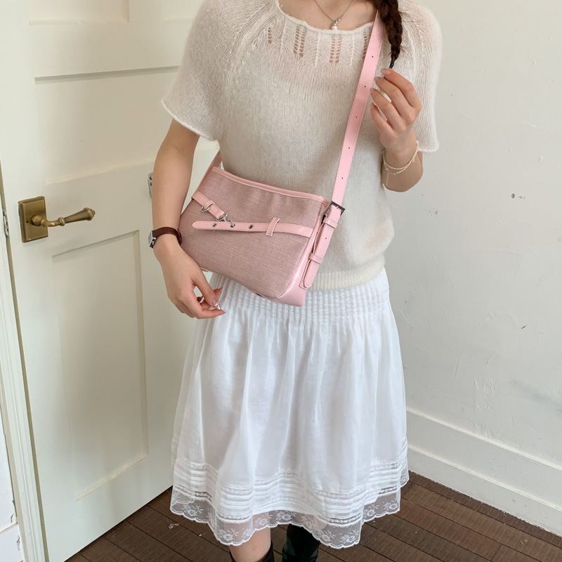 Textura transfronteriza bolso de hebilla de cuero para mujeres 2026 nueva moda diaria bolso de brazo de viaje popular bolso retro