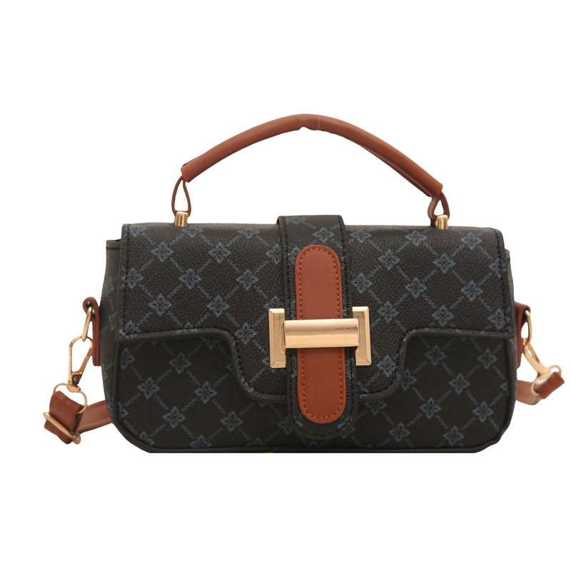 Bagos de color retro retro de estilo extranjero mujeres 2025 nuevo nicho diseño de empalme bolso pequeño bolso portátil de viaje