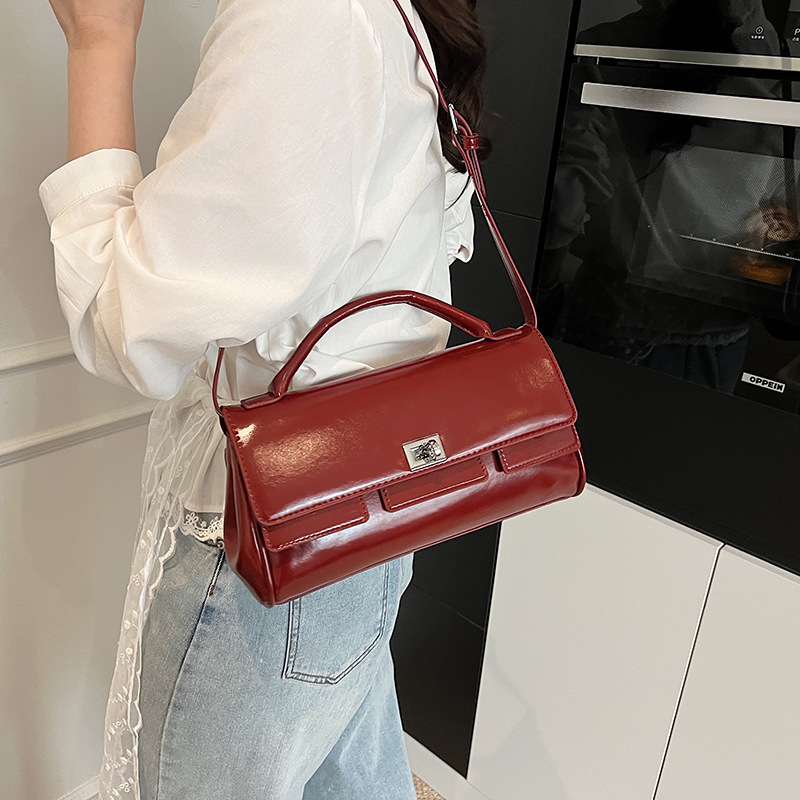 Diseño de nicho 2025 nueva tendencia moda todo-fósforo bolso de mano casual bolso de mensajero de un solo hombro simple