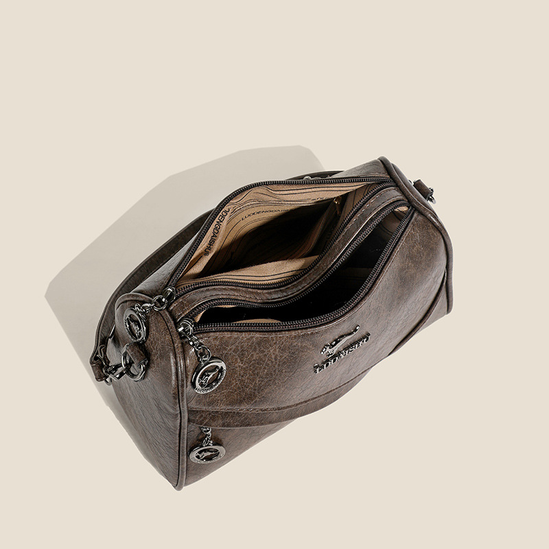 2024 nueva moda atmósfera bolso de hombro de gran capacidad bolso de mochila ligero urbano simple temperamento universal bolso de mujer