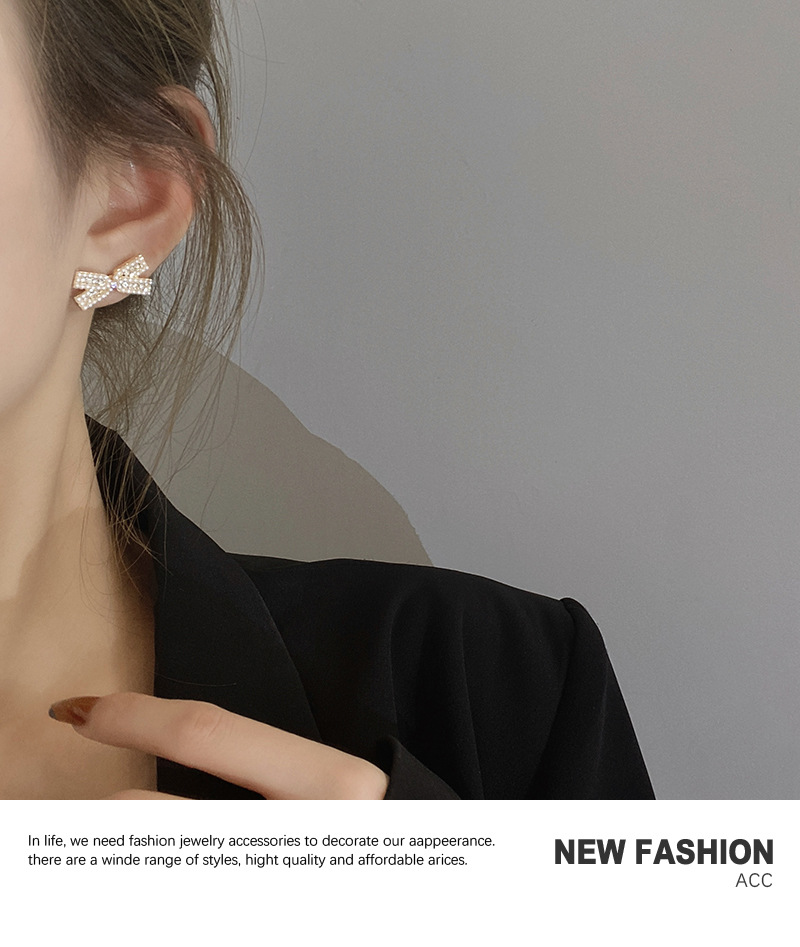 Korean Personality Pearl Earrings Bow Diamond Niche Earrings display picture 5