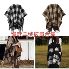 旅行はファッションのレトロな保温マフラーに合わせて、フリンジのマントを厚くして、カシミヤのマントの高級感の水墨画の花に似せます。