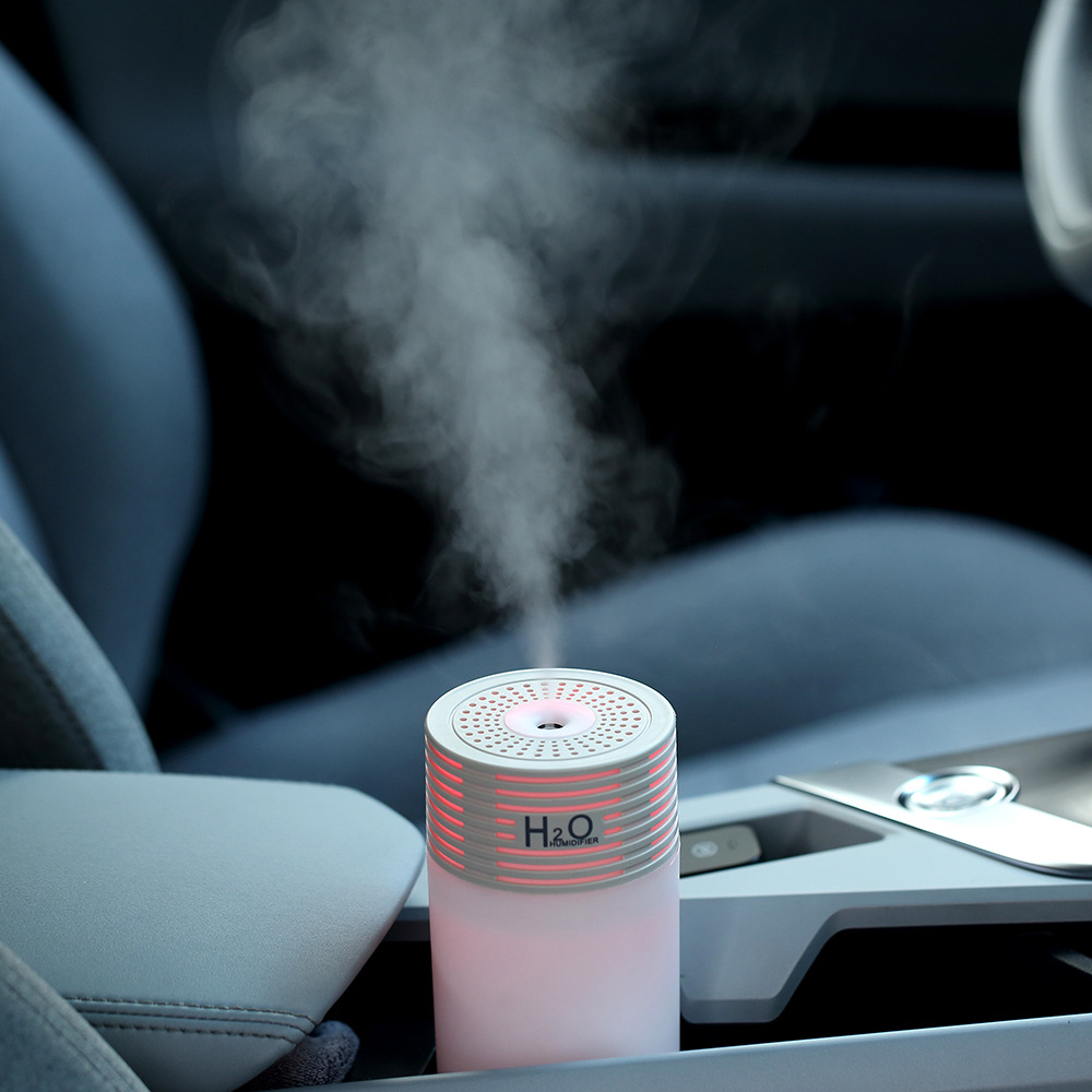 Nuevo humidificador creativo con luz y sombra para dormitorio, escritorio, USB, pequeño, para el hogar, gran volumen de vapor, humidificador para coche, transfronterizo