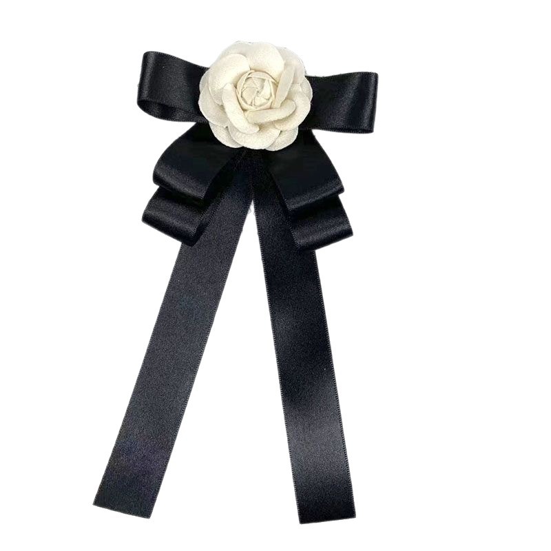 Spilla a fiocco con camelia accessorio vintage per colletto_voghion.com