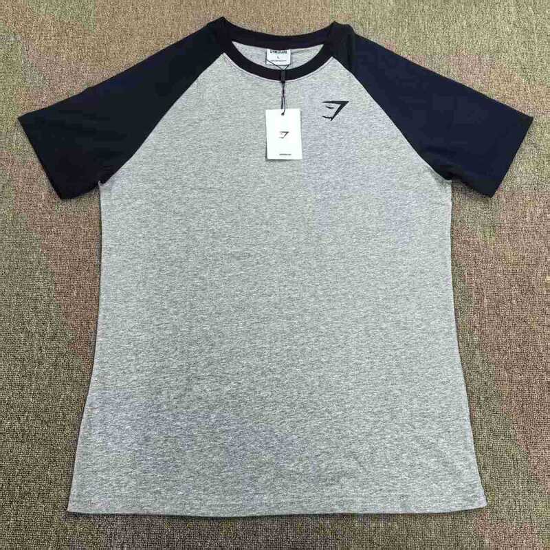 Gymshark raglon修身半袖tシャツ男性は体の弾力性を示しています。|undefined
