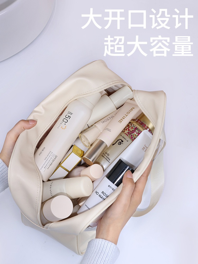 Bolsa de cosméticos de gran capacidad para mujer, nuevo estilo transparente, portátil, bolsa de almacenamiento de cosméticos de aspecto elegante, bolsa de viaje impermeable, bolsa de aseo