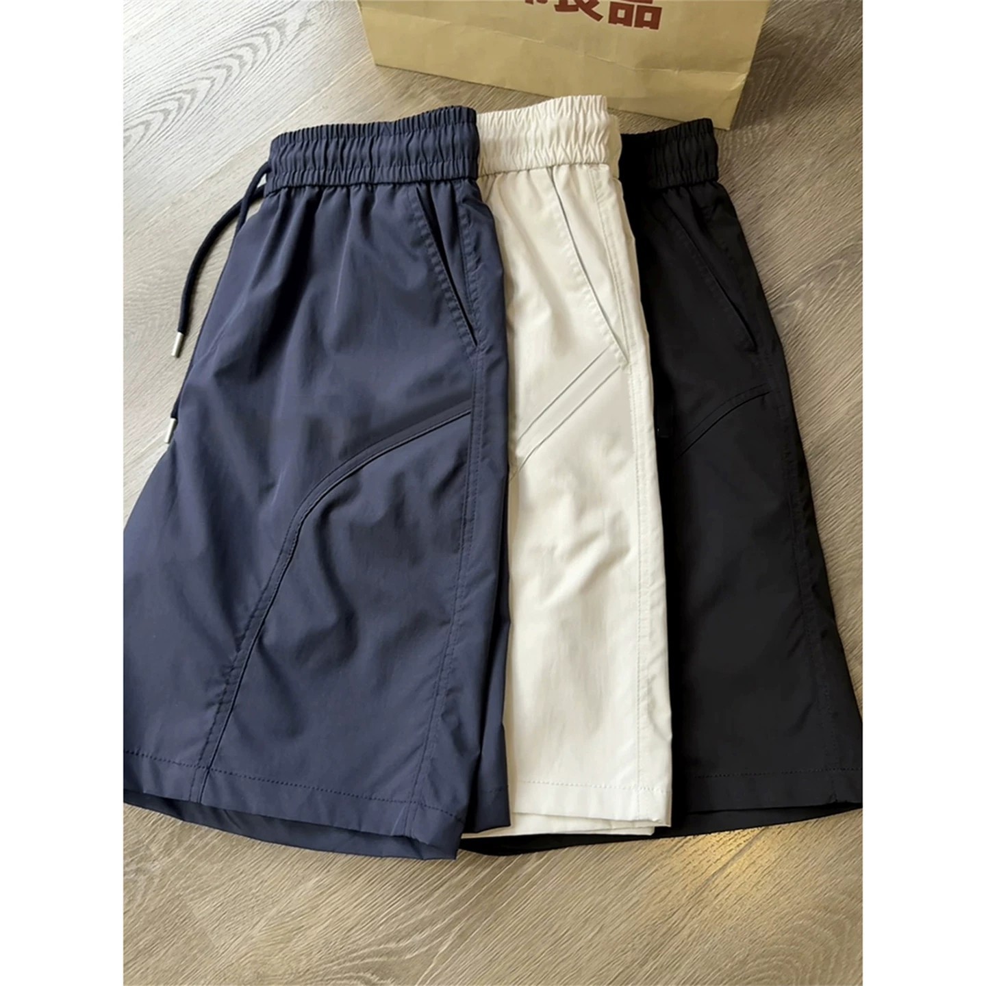 American-style nylon quick-drying shorts for men, thin summer style, diagonal cut, casual fitness pants, sports ice silk beach capri pants