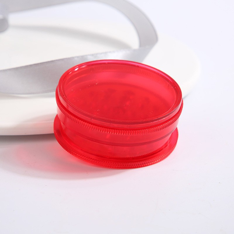 Fábrica directa de cigarrillos transfronterizos venta caliente molino de humo de plástico de tres capas 60mm molino manual triturador de humo