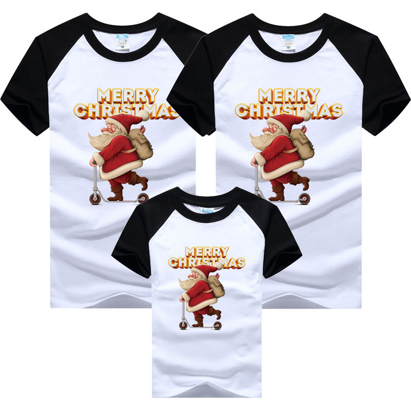 Traje padre-hijo una manga raglán de cuatro bocas verano levante la mano Navidad patineta Santa Claus niños manga corta color a juego transfronterizo camiseta