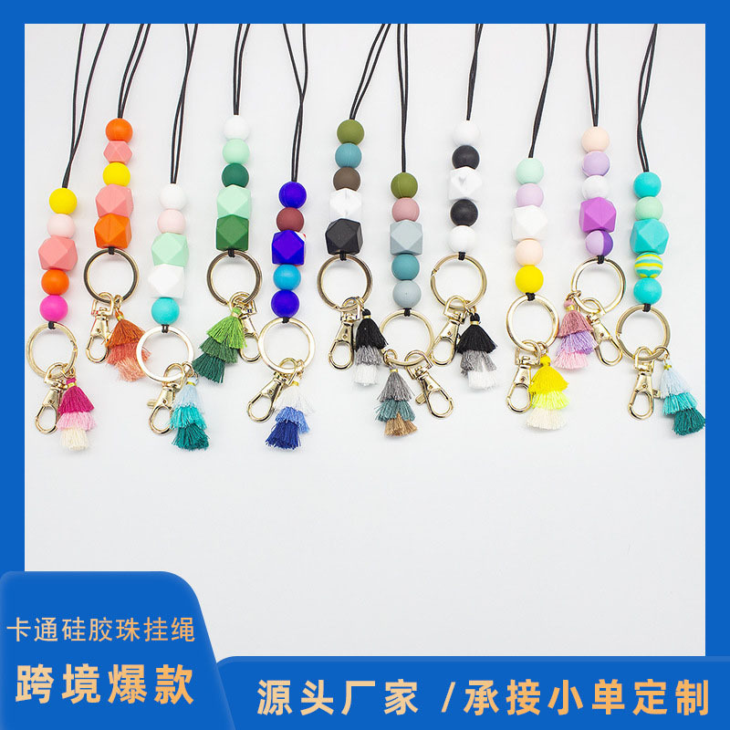 Cordón de cuentas de silicona de dibujos animados collar de goma suave Estudiante Adulto fiesta universal colgante borla cordón llavero