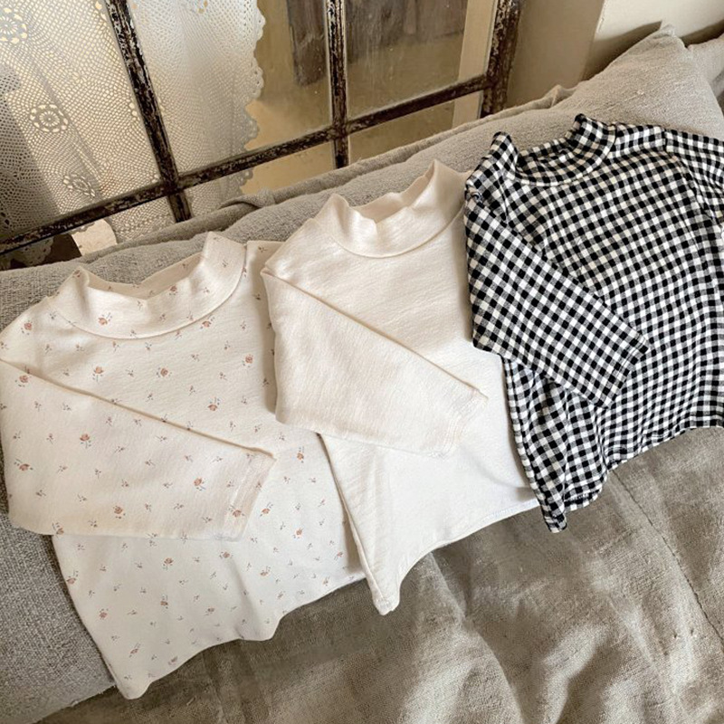 Camisa de fondo de primavera para niños Ropa de estilo coreano para niños bebé principios de primavera Jersey de algodón para niña medio cuello alto camisa de fondo