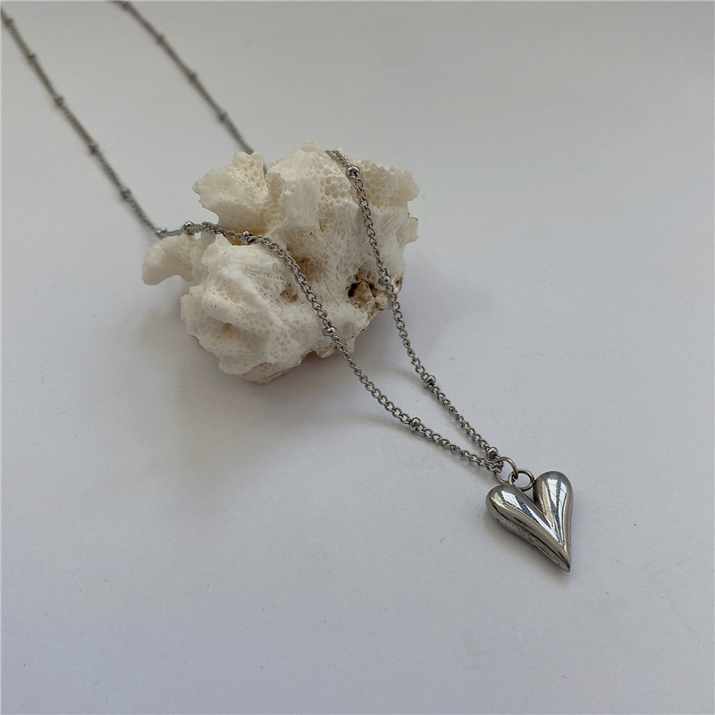 Collier long pendentif cœur géométrique vintage pour femme_voghion.com