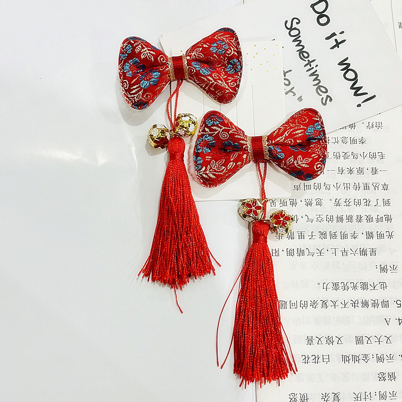 红色毛球珍珠流苏发夹