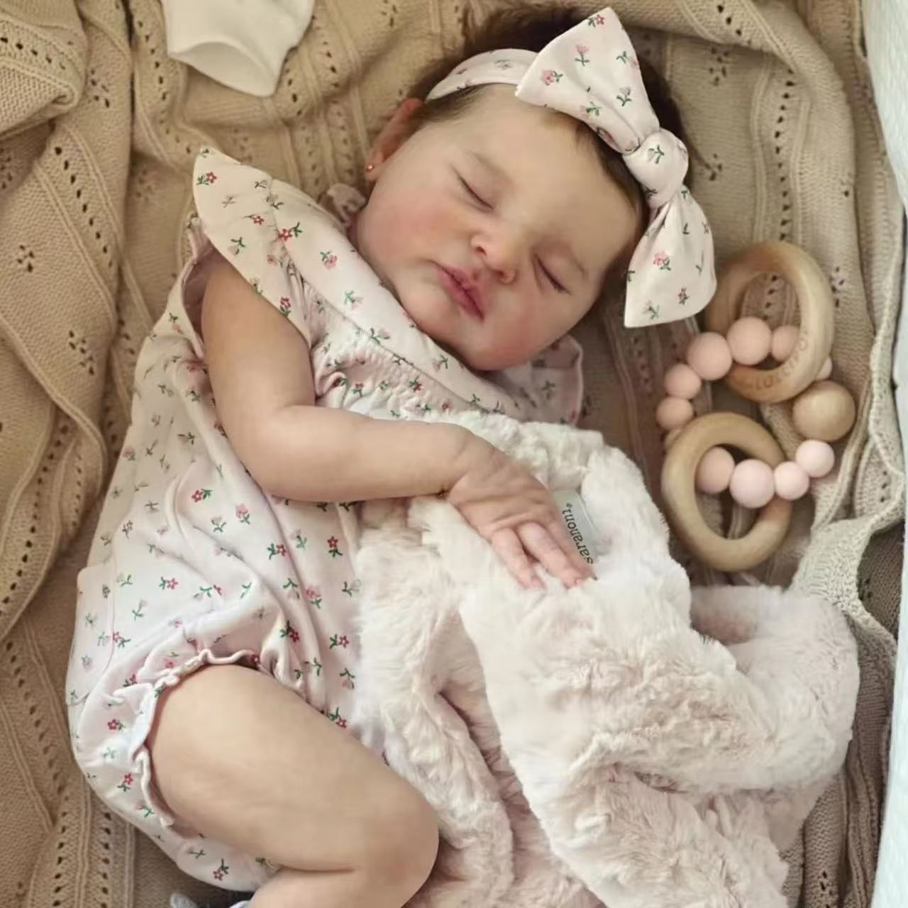 Hable con estampado NPK de 19 pulgadas muñeca de simulación hecha a mano Laura para regalar juguetes navideños para niños