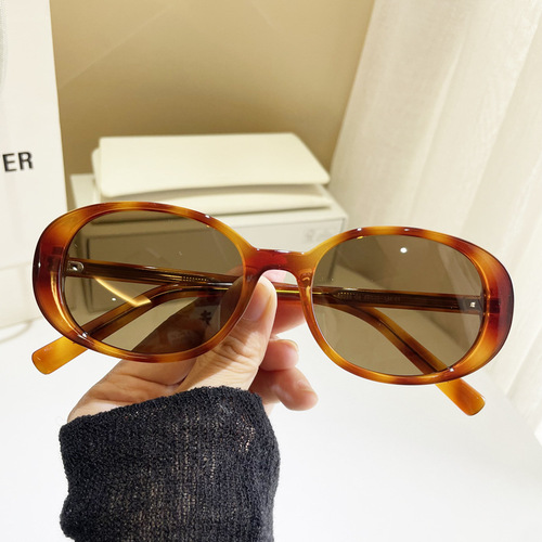 Small oval frame sunglasses for women, high-end vacation seaside anti-UV white frame polarized sunglasses personality