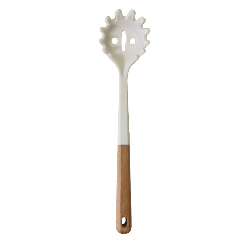 Cuchara de sopa de espátula de silicona transfronteriza Juego de 13 piezas de sartén antiadherente Pala de silicona de grado alimenticio Juego de utensilios de cocina de silicona blanca lechosa al por mayor