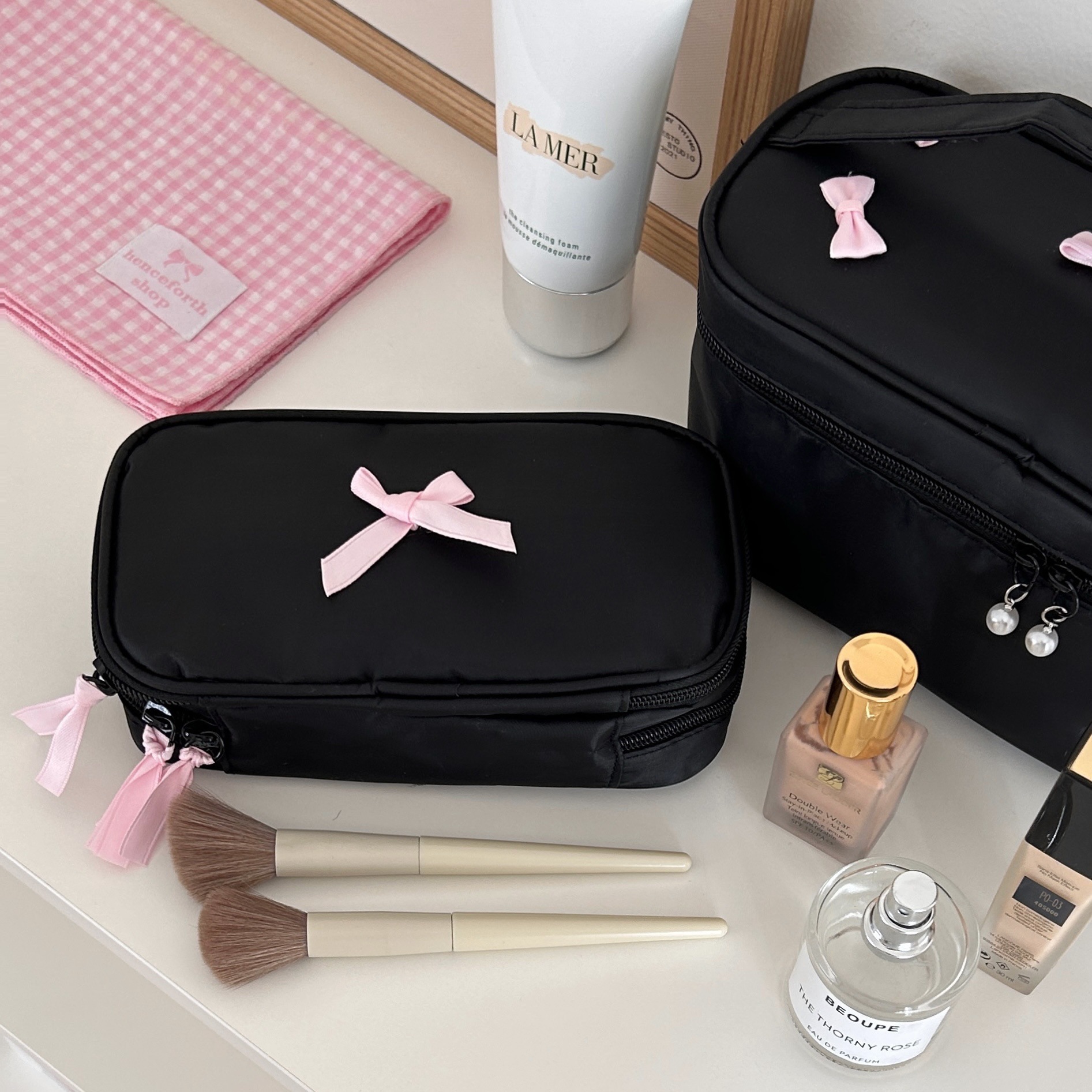 Bolsa de maquillaje de crema de polvo de arco para mujeres 2024 nuevo estilo de alta belleza portátil de gran capacidad bolsa de lavado de viaje bolsa de almacenamiento