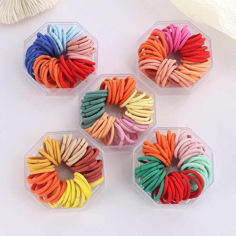 Banda para el cabello de los niños de Año Nuevo Mini banda de goma pequeña bebé no duele pelo banda de goma elástica alta lazo tirar Arco Iris pequeña cabeza cuerda