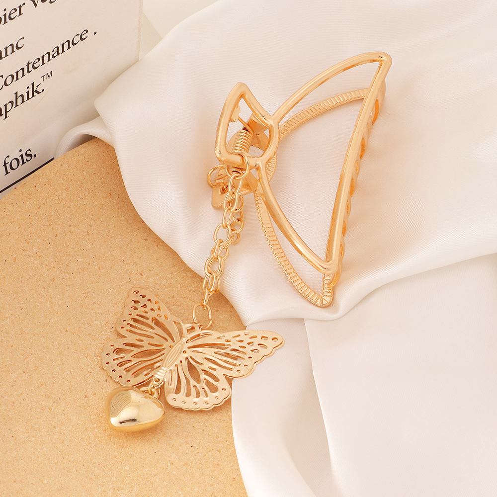 Wholesale Jewelry Pearl Tassel Butterfly Metal Korean Style Catch Clip Nihaojewelry display picture 5