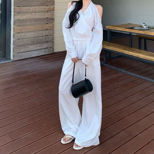 Designer-style spicy white cross-cropped long-sleeve shirt for women, summer fashion set with relaxed wide-leg pants, two-piece set