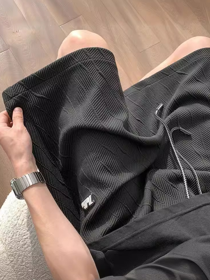 Pantalones cortos casuales de carretera con textura de textura de alta calidad, pantalones de cinco puntos de la marca de moda, pantalones de todo fósforo de estilo de Hong Kong, guapos