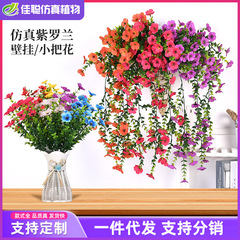 シミュレーションバイオレットは結婚祝いの装飾品を生け花家庭用の偽花の壁掛け皿蘭デパートのショーウインドーに飾った