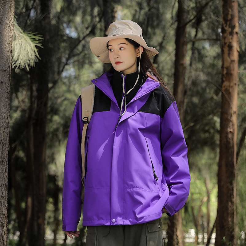 Chaqueta de invierno al aire libre para hombres y mujeres tres en uno de dos piezas de lana engrosada chaqueta de alpinismo a prueba de viento al por mayor en vivo