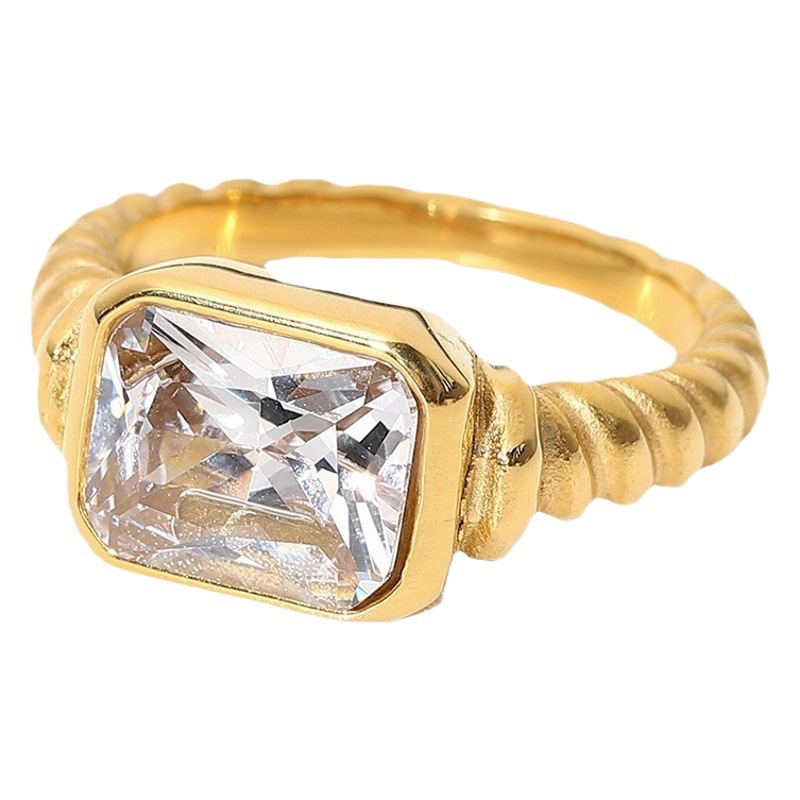 Europeo y americano de acero inoxidable rectangular esmeralda Rosa circón anillo de las mujeres croissant torcido espiral anillo joyería