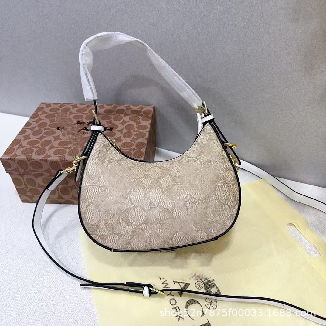 2023新型潮クロスボーダー対外貿易女性バッグ腋の下三日月包復古老花手提げシングル肩斜めショルダーバッグロゴ付き