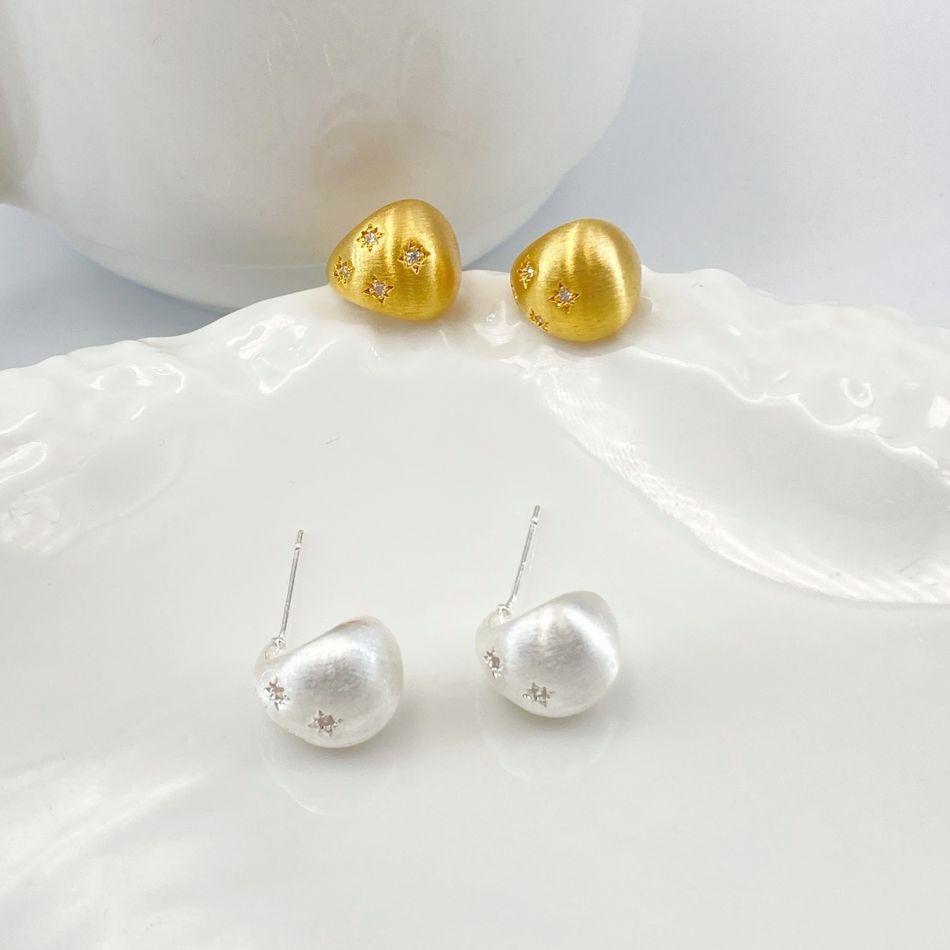 Matte elegant small universal earrings with zircon