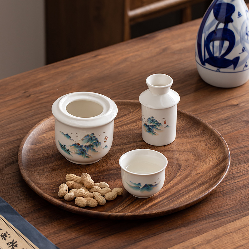 Jade-Colored Ceramic Wine Warmer Set for White Wine, Yellow Wine, and Sake, with a Modern Chinese Style, Practical for Home Use, Including Wine Divider and Wine Cup Set